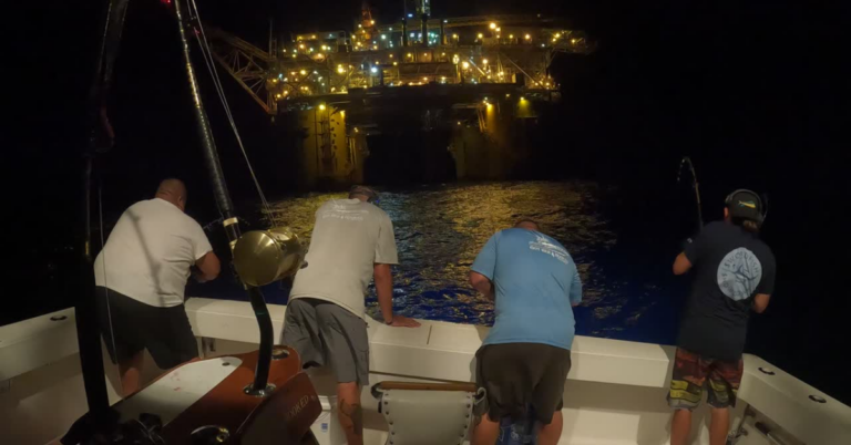 Night fishing near an oil rig off of Galveston